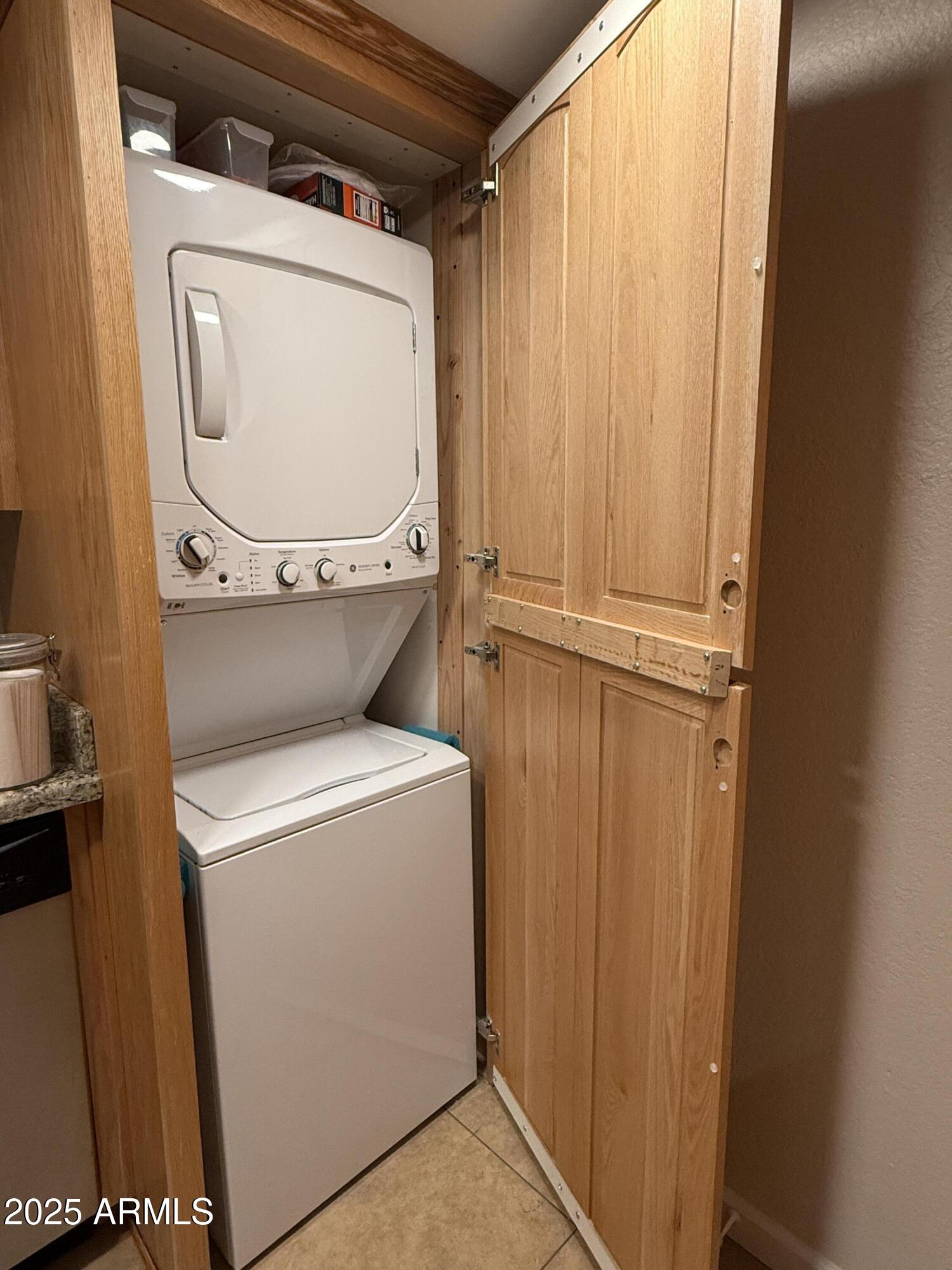 3825 East Camelback Road, Unit 120 Phoenix, AZ 85018 - Photo 6 of 39 a utility room with dryer and washer