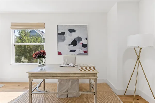 a view of a workspace with furniture