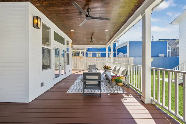a front view of a house with outdoor seating