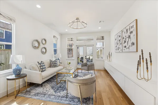 a living room with furniture and a table