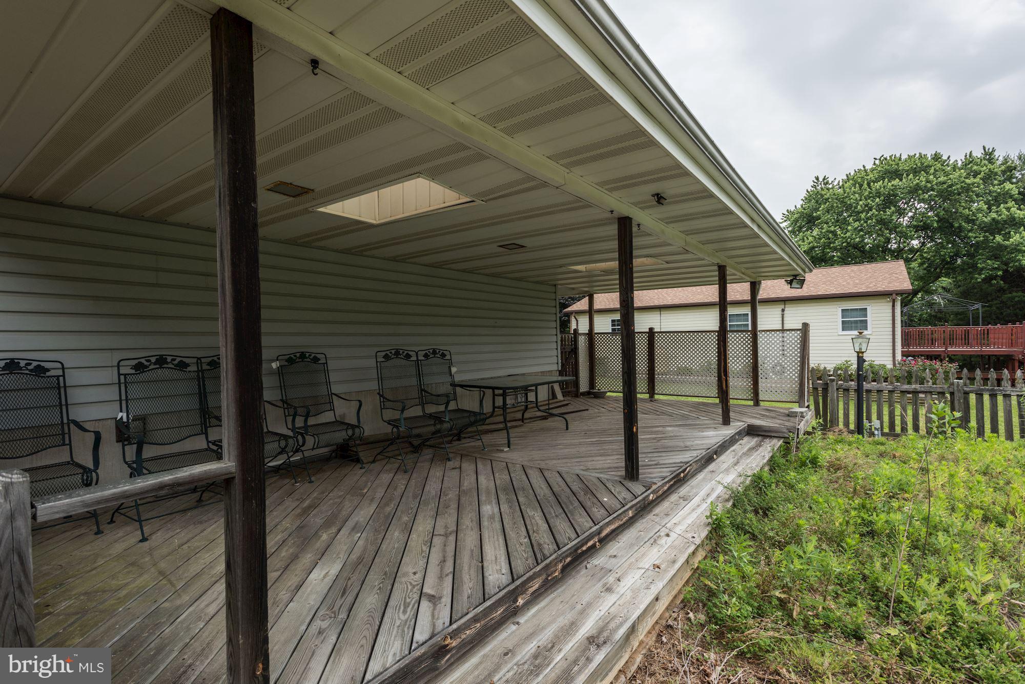 2514 Braddock Road Mount Airy, MD 21771 - Photo 26 of 30 a view of a balcony with chairs