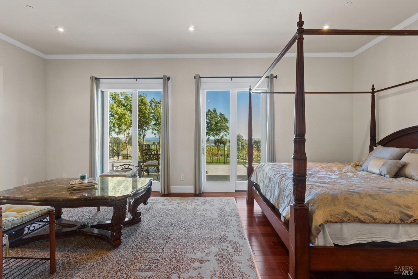 3001 Sears Point Road Sonoma, CA 95476 - Photo 23 of 52 a bedroom with a bed and large windows