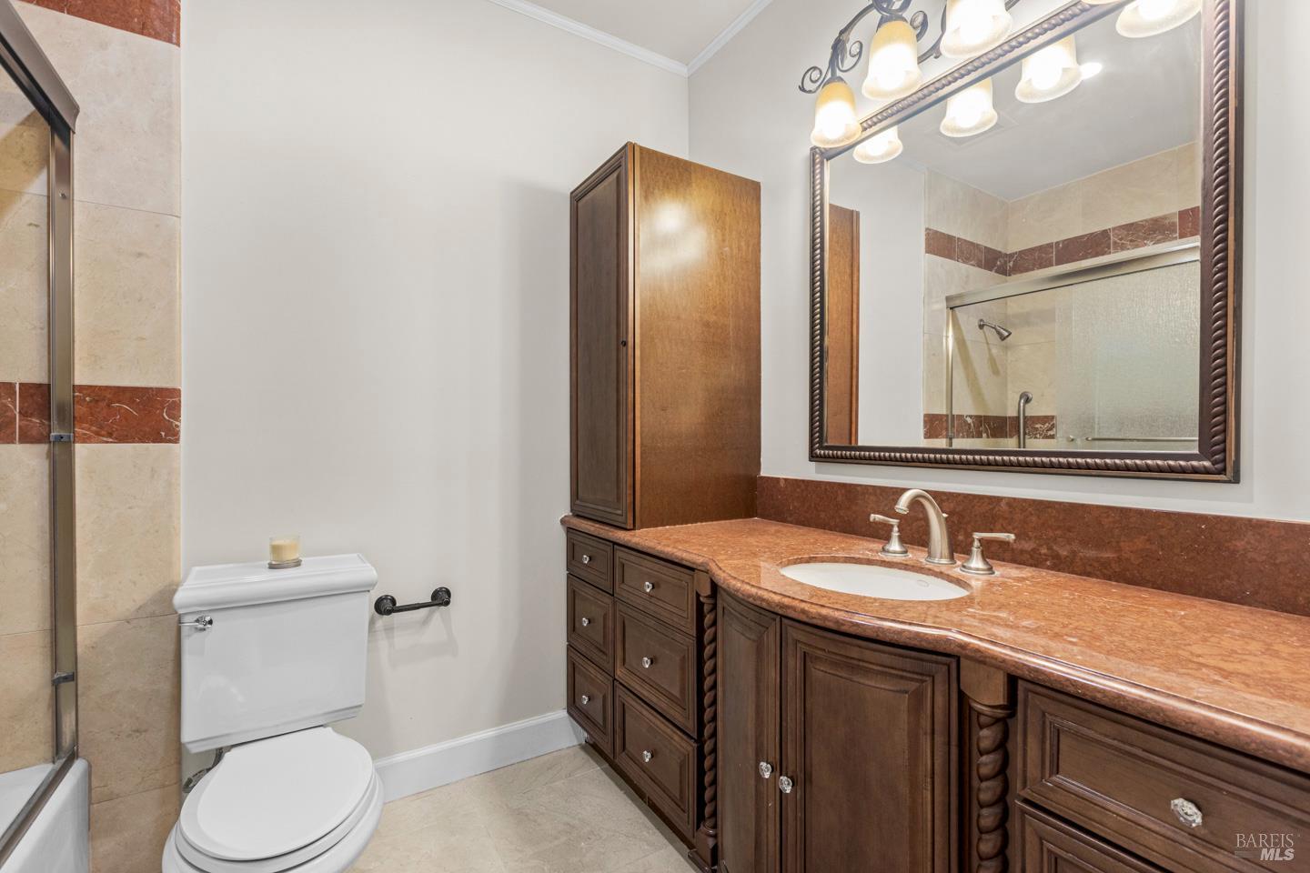 3001 Sears Point Road Sonoma, CA 95476 - Photo 35 of 52 a bathroom with a granite countertop sink mirror and toilet