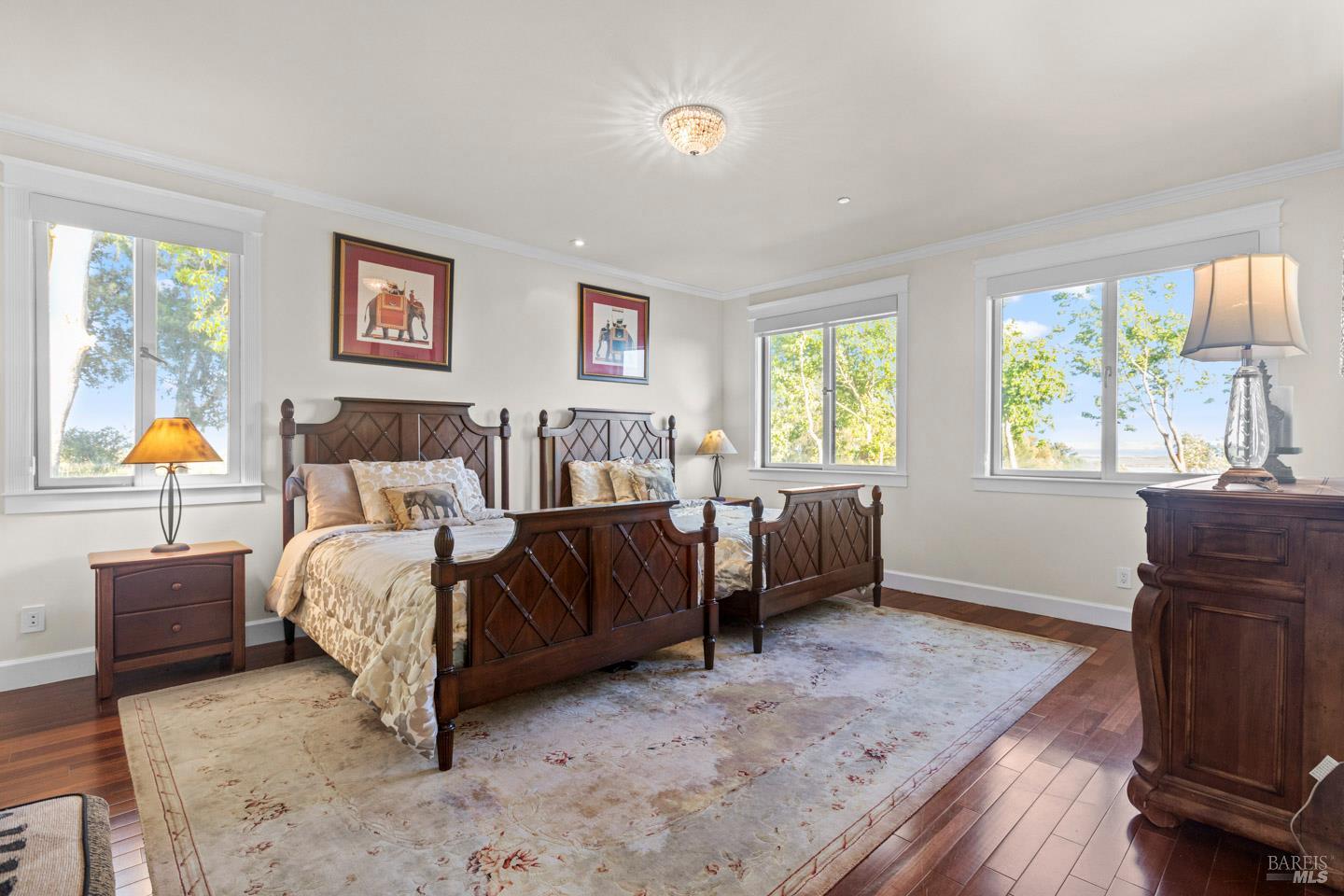 3001 Sears Point Road Sonoma, CA 95476 - Photo 36 of 52 a bedroom with a bed and wooden floor