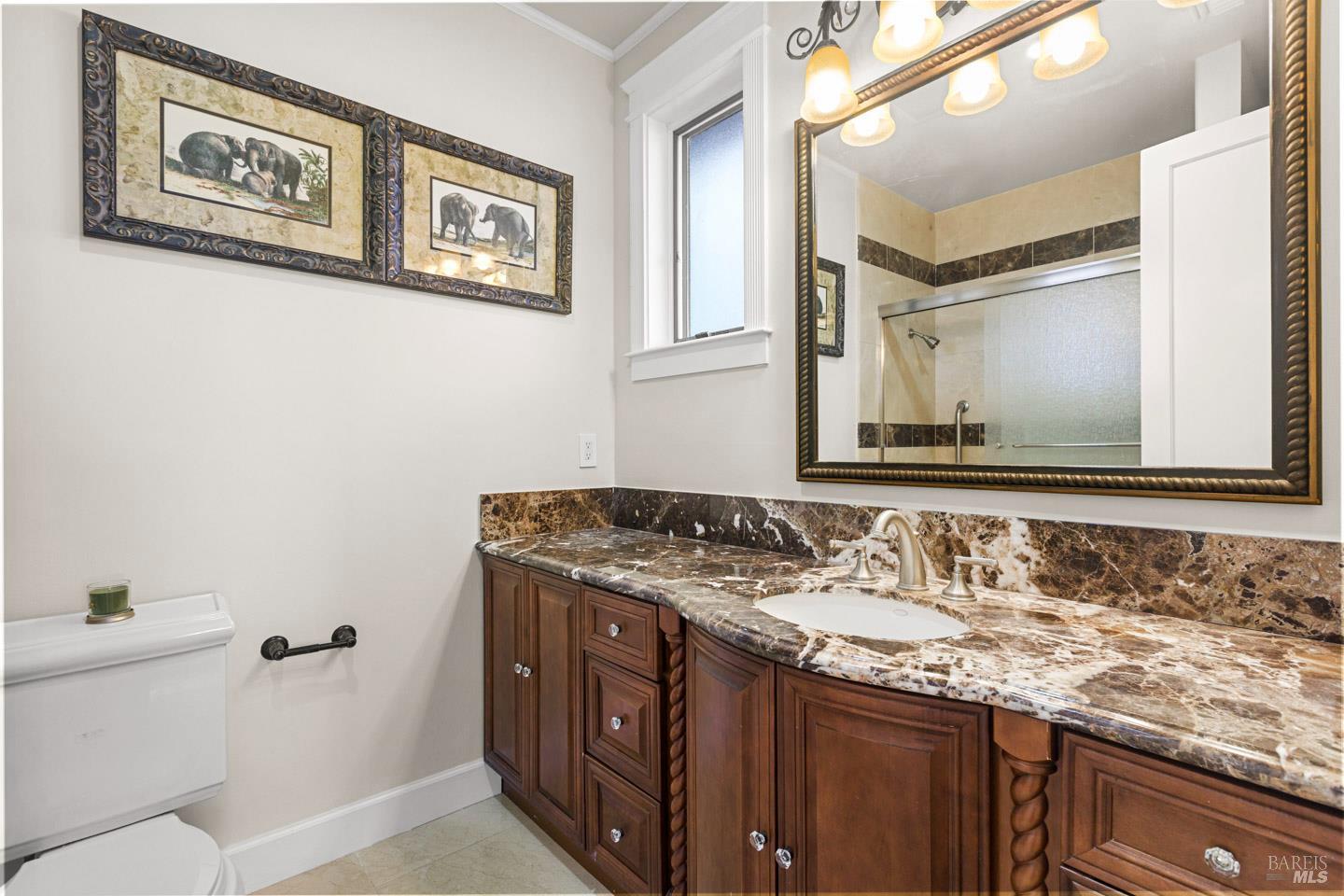 3001 Sears Point Road Sonoma, CA 95476 - Photo 38 of 52 a bathroom with a granite countertop sink mirror and toilet