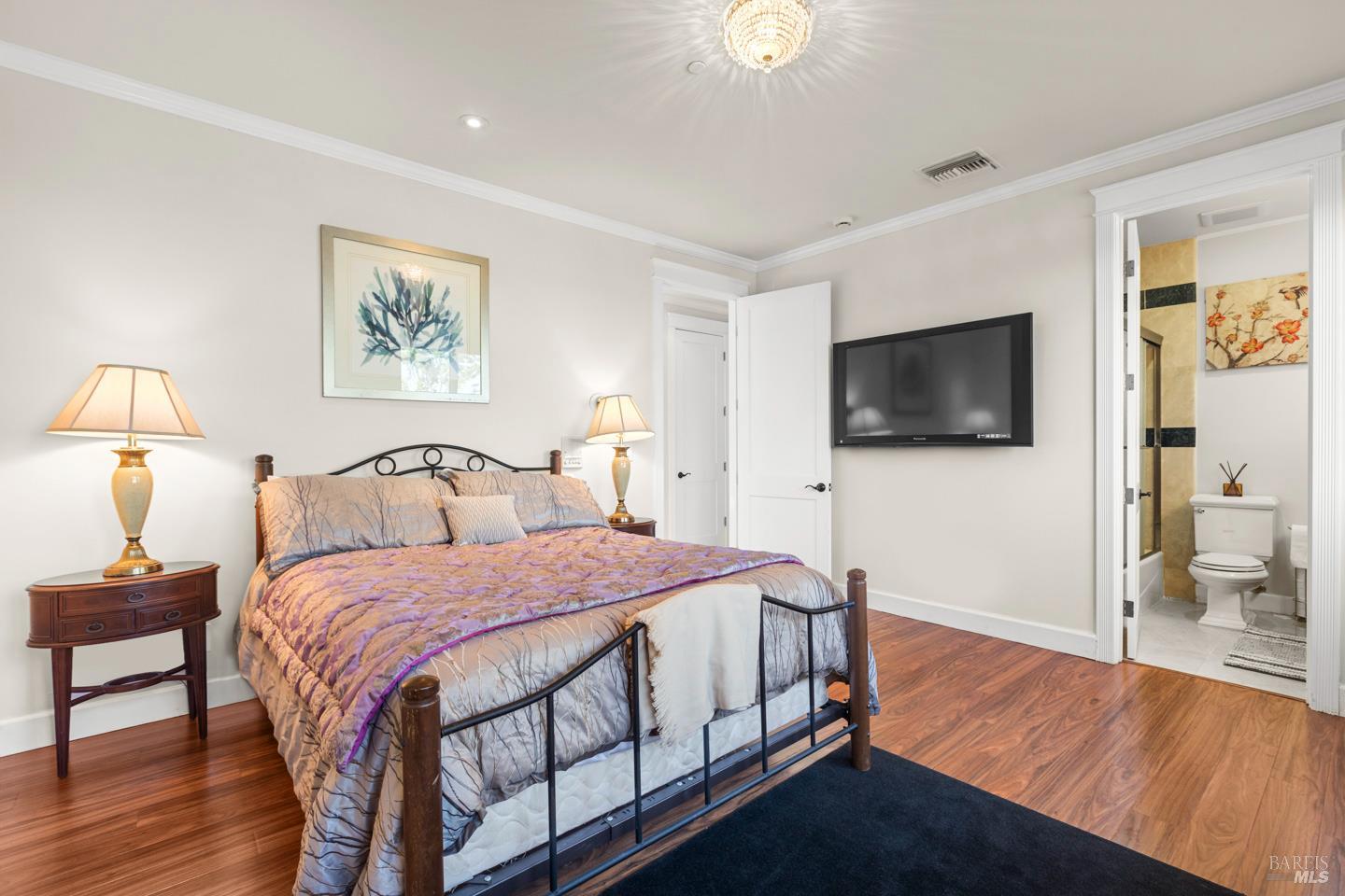 3001 Sears Point Road Sonoma, CA 95476 - Photo 39 of 52 a spacious bedroom with a bed and a flat screen tv