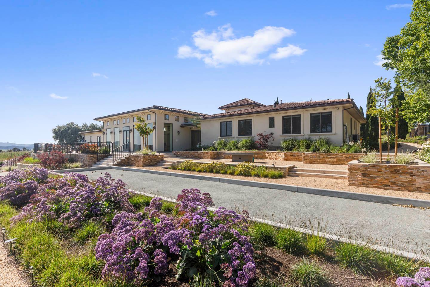3001 Sears Point Road Sonoma, CA 95476 - Photo 45 of 52 a front view of a house with a yard and fountain