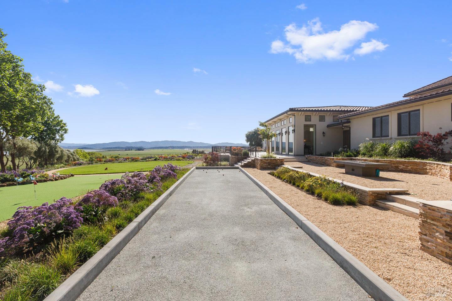 3001 Sears Point Road Sonoma, CA 95476 - Photo 48 of 52 a view of a house with a yard and potted plants