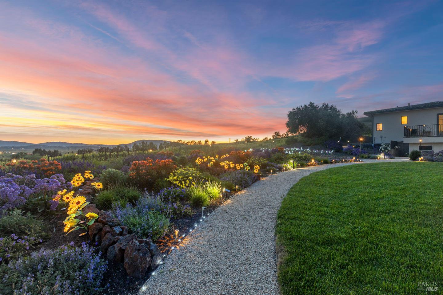 3001 Sears Point Road Sonoma, CA 95476 - Photo 7 of 52 a view of a garden with mountains in the background