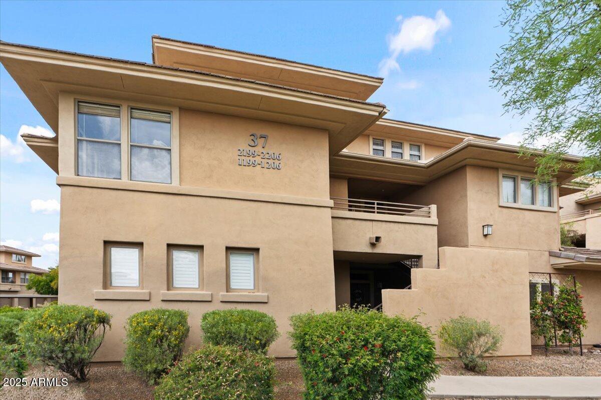 a front view of a house with a garage