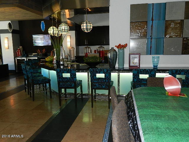20100 North 78th Place, Unit 2203 Scottsdale, AZ 85255 - Photo 32 of 35 a view of a dining room with furniture