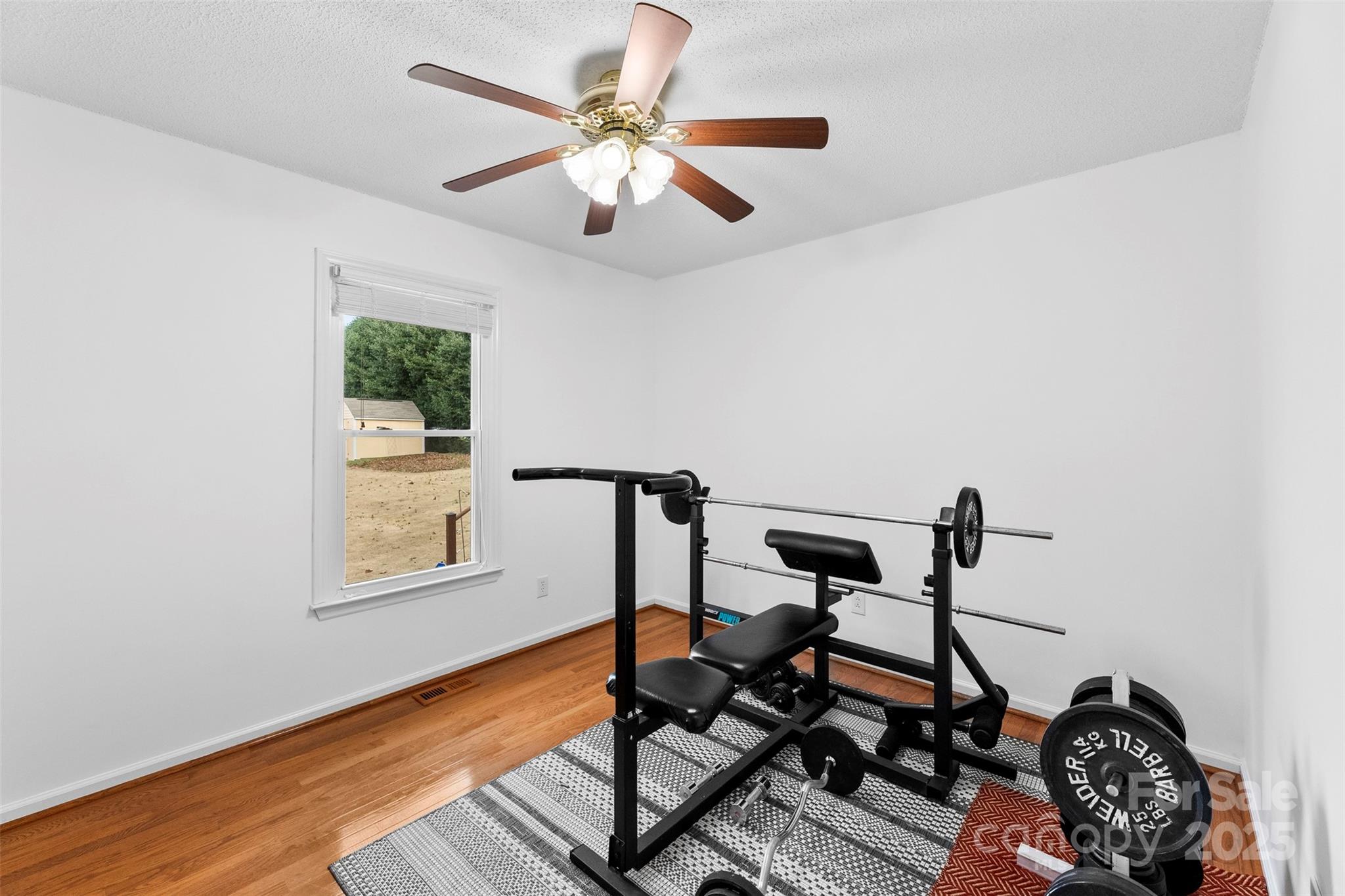 715 Deese Road Monroe, NC 28110 - Photo 19 of 28 a view of a workspace with furniture and a window