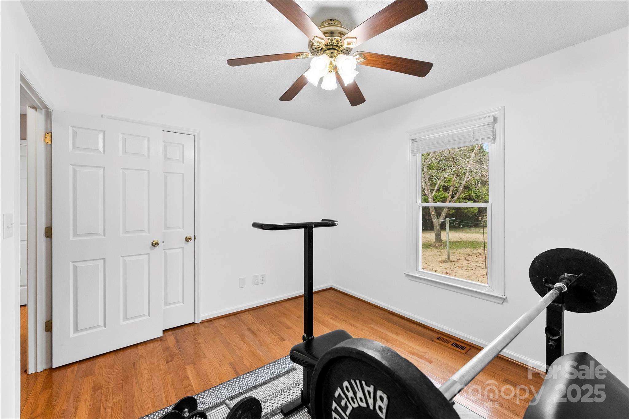 715 Deese Road Monroe, NC 28110 - Photo 20 of 28 a bedroom with furniture and a window