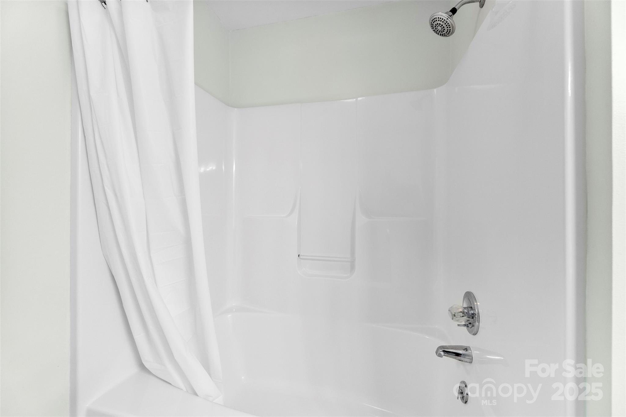 715 Deese Road Monroe, NC 28110 - Photo 23 of 28 a bathroom with a bathtub