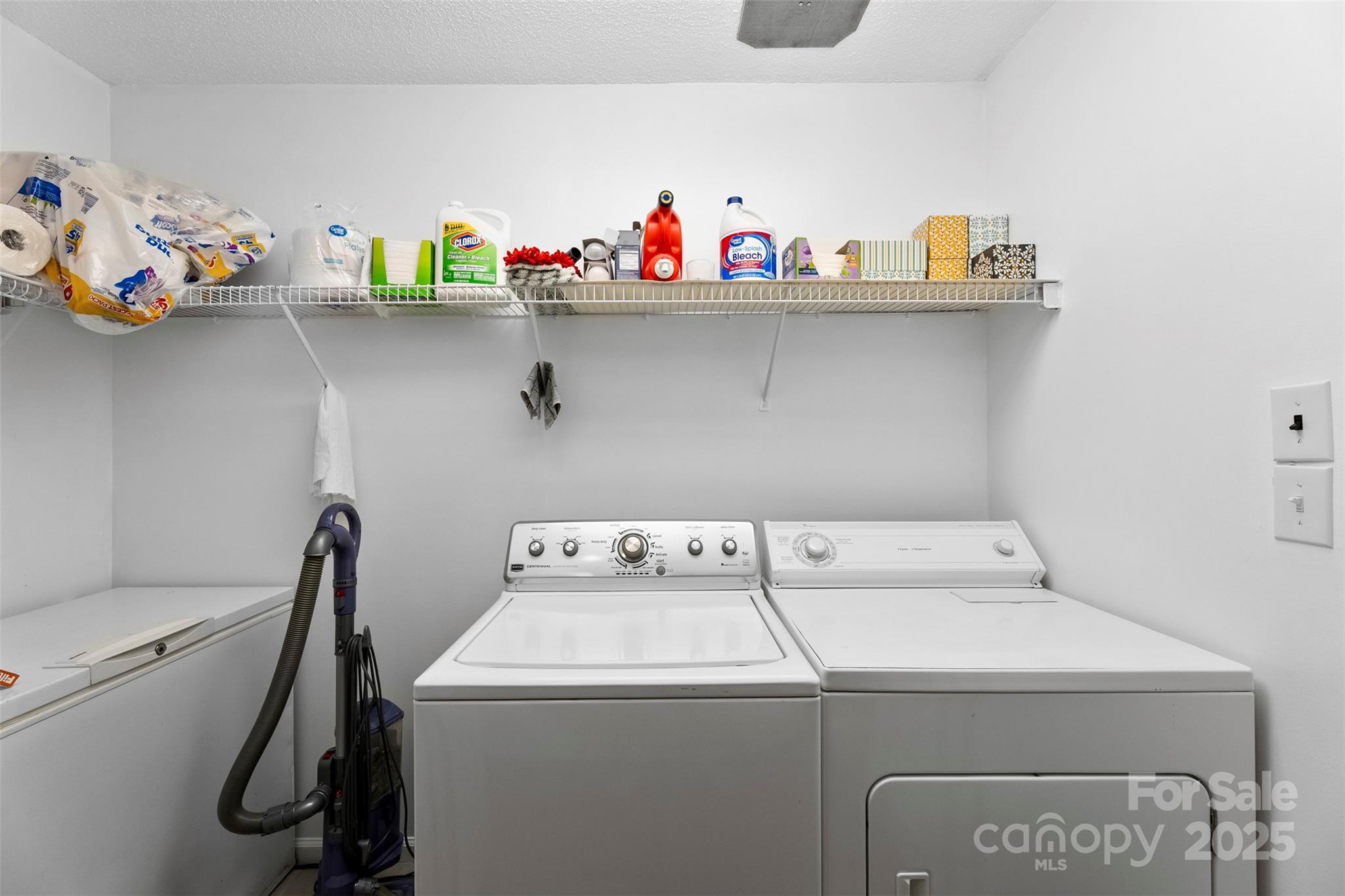 715 Deese Road Monroe, NC 28110 - Photo 24 of 28 a utility room with dryer washer and shoe rack