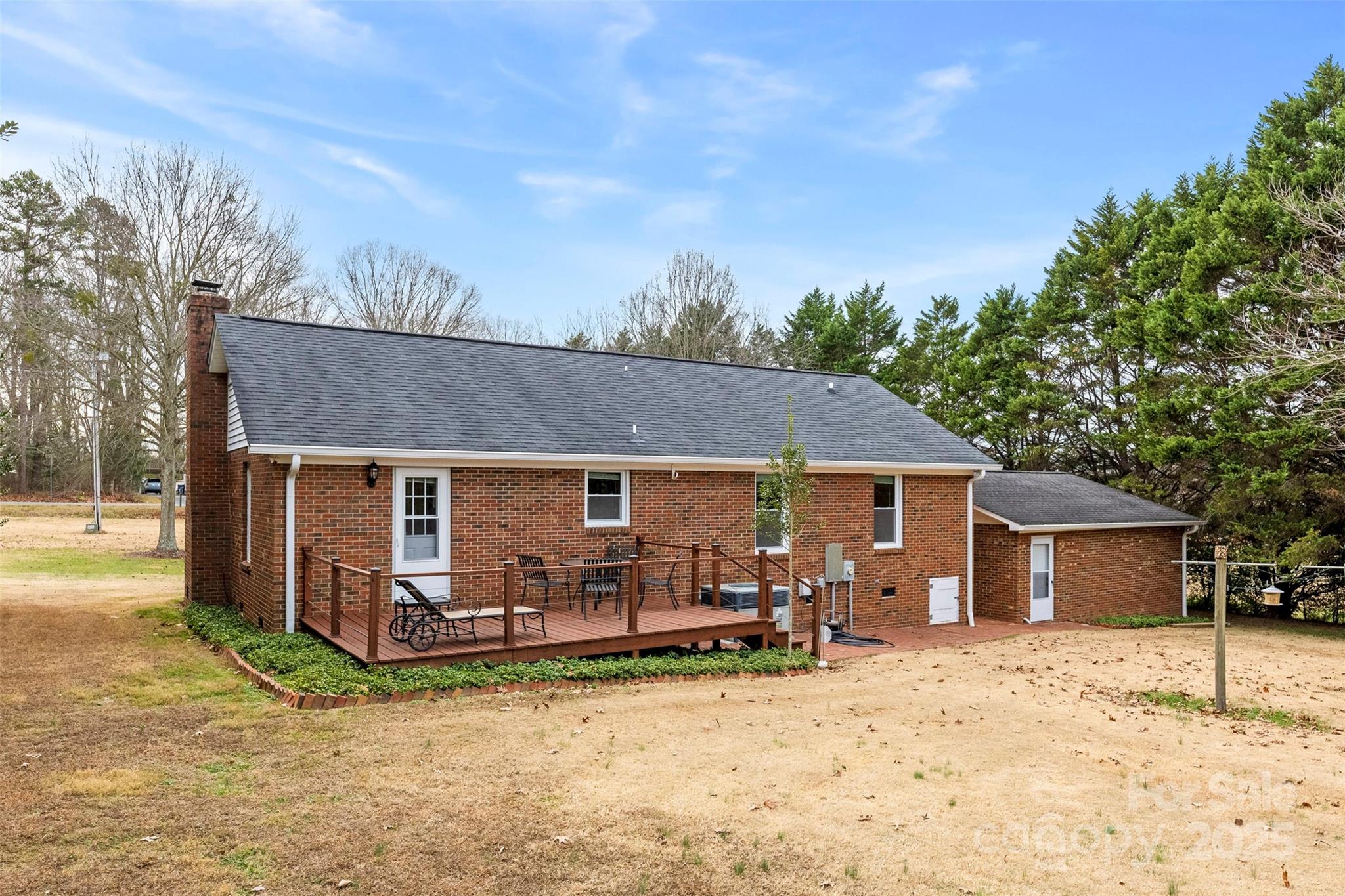 715 Deese Road Monroe, NC 28110 - Photo 27 of 28 a view of a house with backyard and chairs