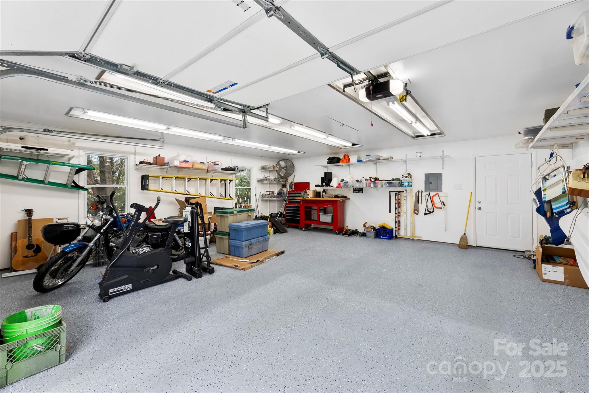 715 Deese Road Monroe, NC 28110 - Photo 4 of 28 a view of a garage with a bike and car