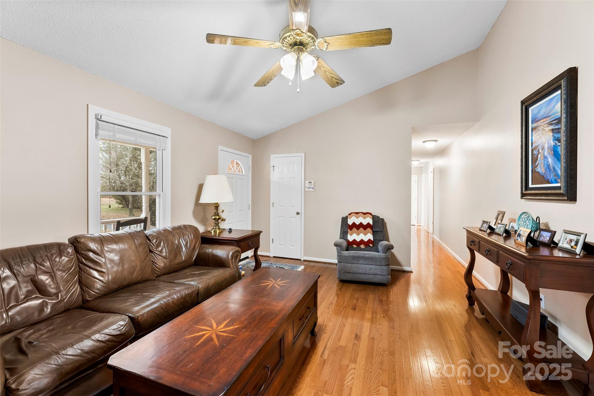 715 Deese Road Monroe, NC 28110 - Photo 8 of 28 a living room with furniture and wooden floor