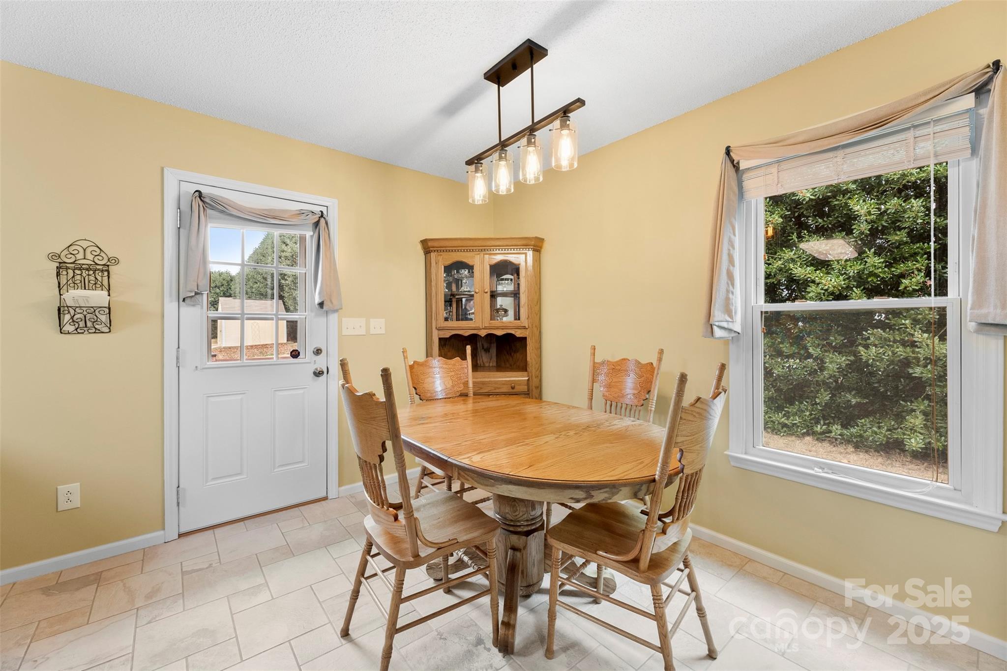715 Deese Road Monroe, NC 28110 - Photo 10 of 28 a dining room with furniture and window