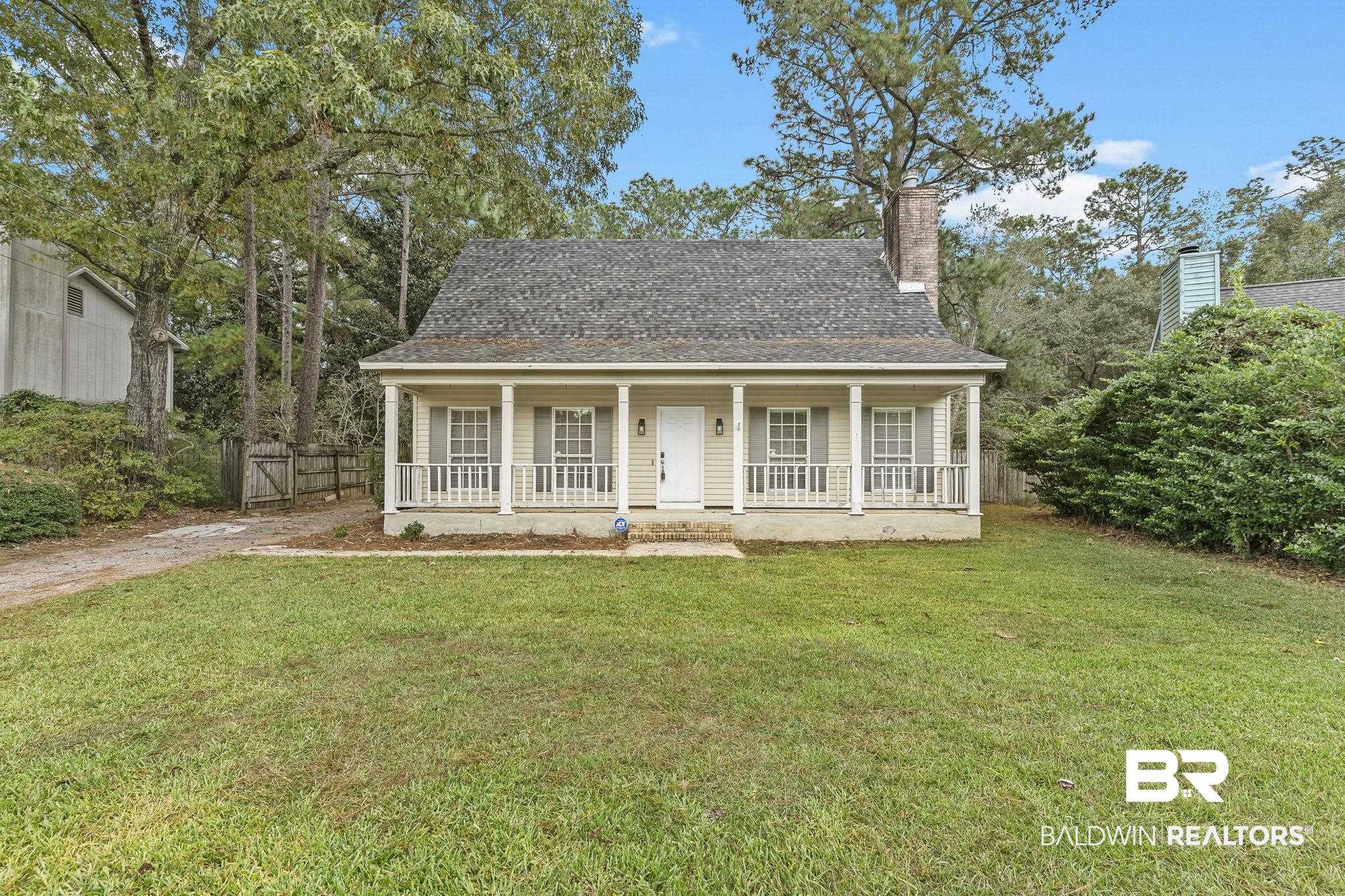 474 Ridgewood Drive Daphne, AL 36526 - Photo 3 of 57 View of front of home with a front yard and a porch