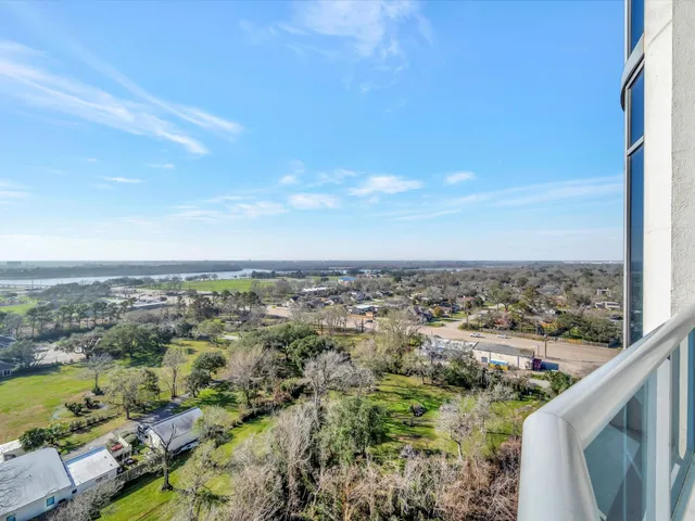 a large kitchen with a table and chairs