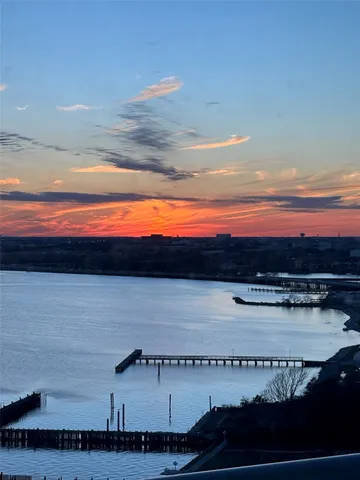 a view of swimming pool outdoor seating and yard