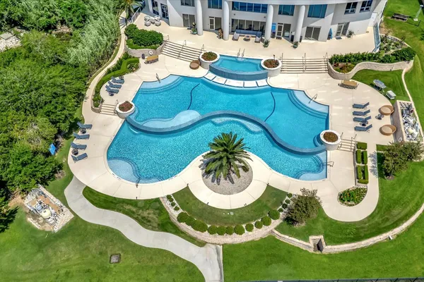 a living room with furniture and fireplace
