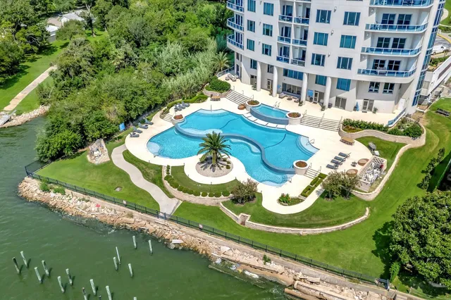 a living room with furniture and entry gate
