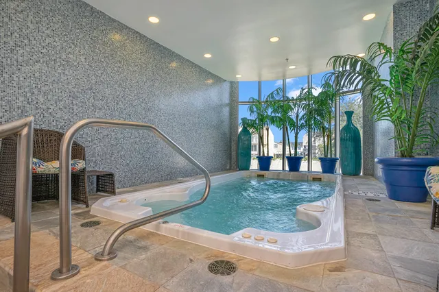 a view of a lake with tall buildings