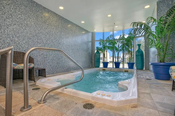 a view of a lake with tall buildings