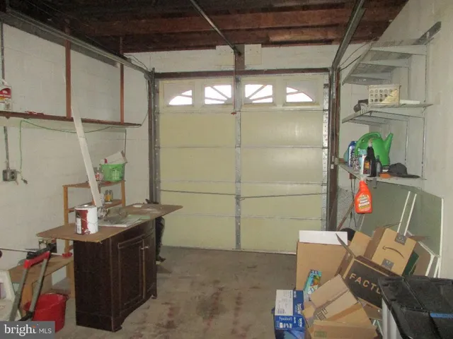 a bathroom with a tub and shower