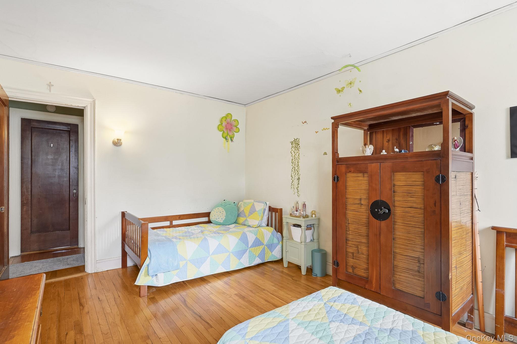 23 Old Mamaroneck Road, Unit 3L White Plains, NY 10605 - Photo 12 of 16 Bedroom with wood-type flooring