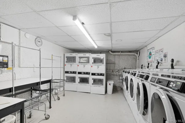 a view of a storage & utility room with washer and dryer