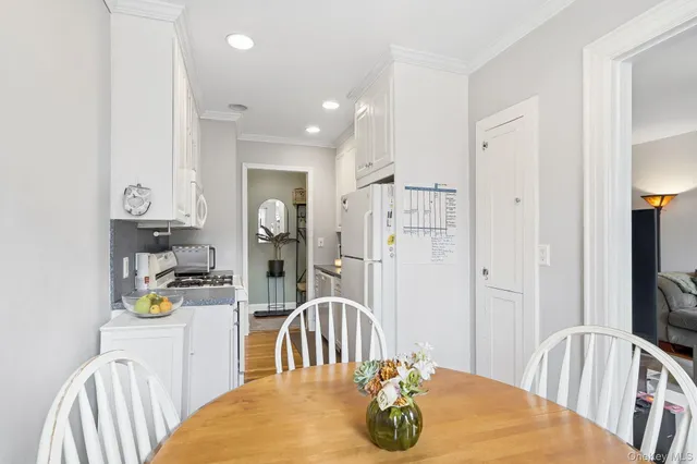 a very nice looking dining room with a table and chairs