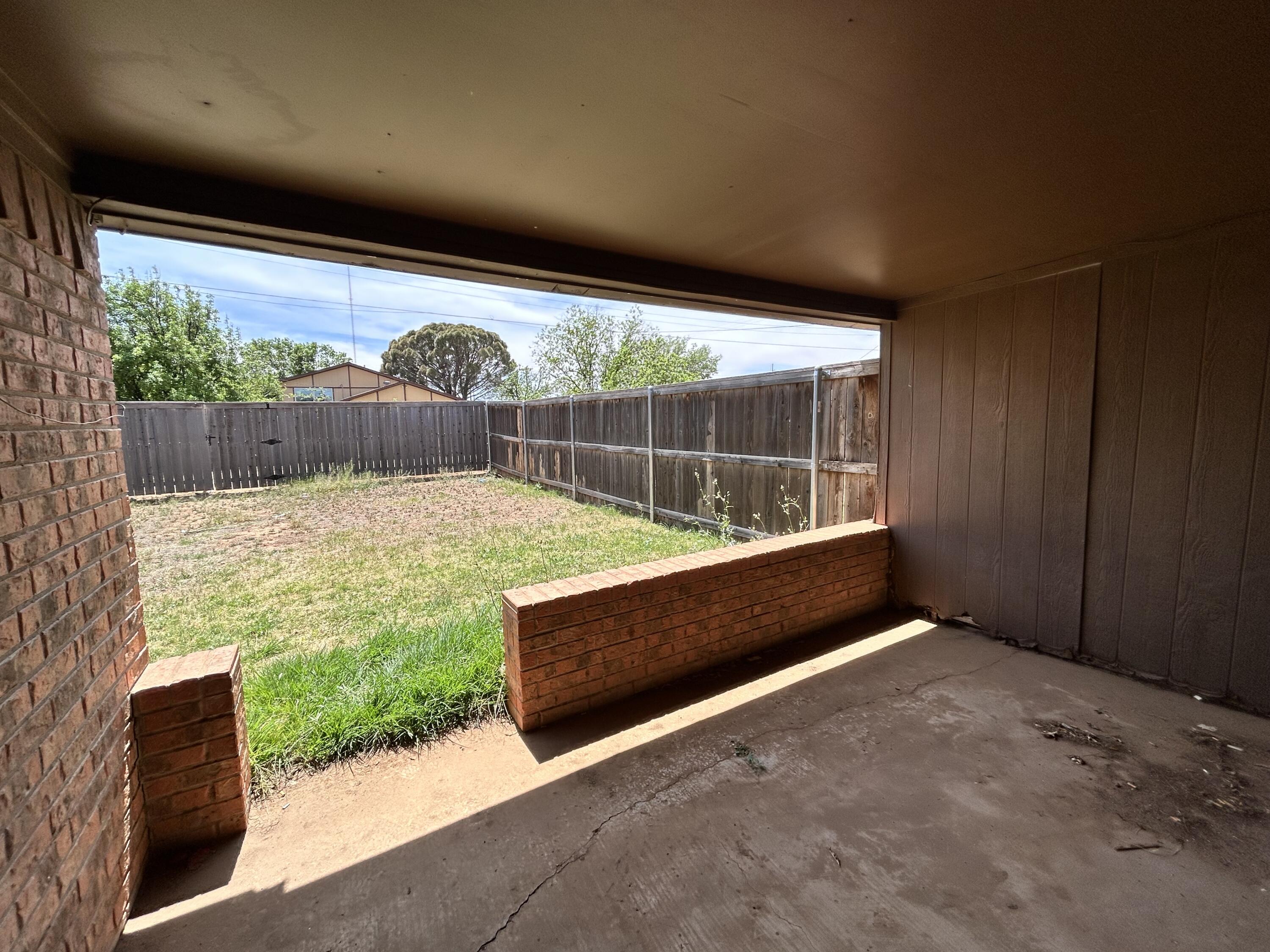 1115 80th Street, Unit A Lubbock, TX 79423 - Photo 15 of 16 a view of outdoor space and yard