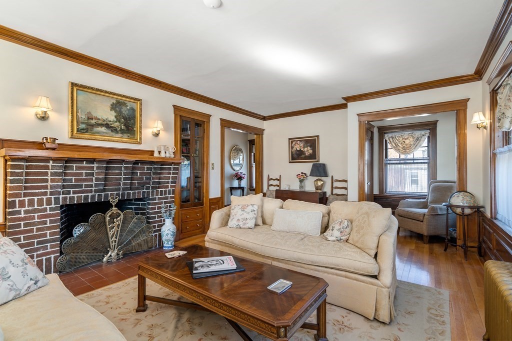 18 Fairfax Road Milton, MA 02186 - Photo 9 of 30 a living room with furniture and a fireplace