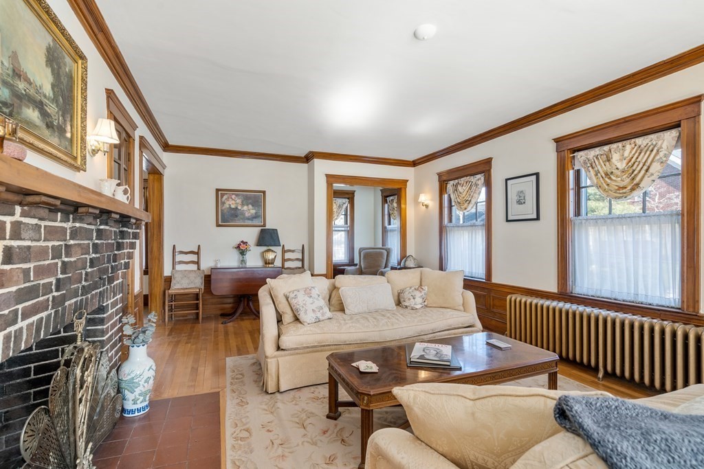 18 Fairfax Road Milton, MA 02186 - Photo 10 of 30 a living room with furniture and a window