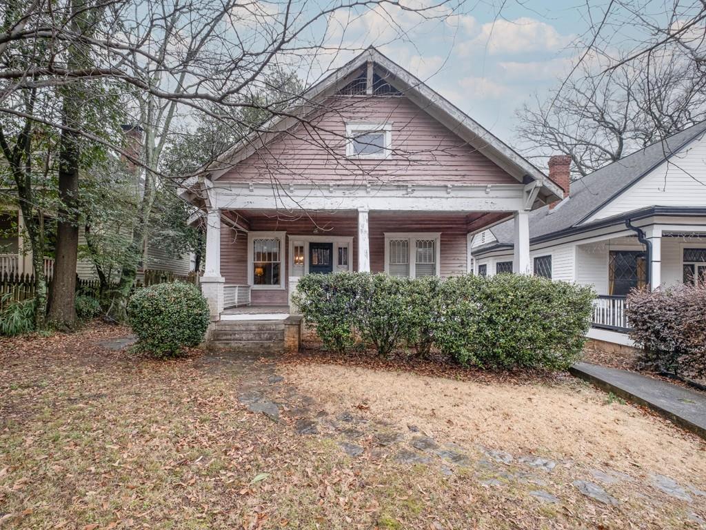 417 West Howard Avenue Decatur, GA 30030 - Photo 1 of 1 a front view of a house with a yard