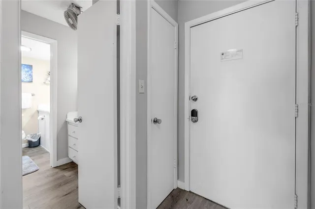 a view of a balcony with wooden floor