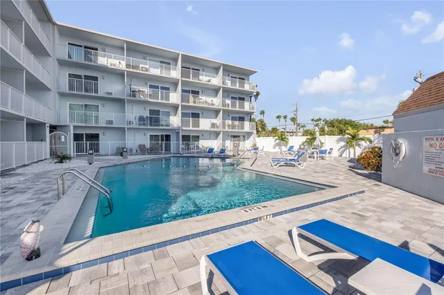 a view of a house with a swimming pool