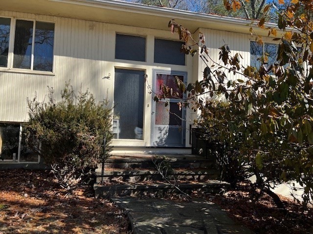 17 Suffolk Road Wellesley, MA 02481 - Photo 3 of 6 a view of a house with a tree and front door