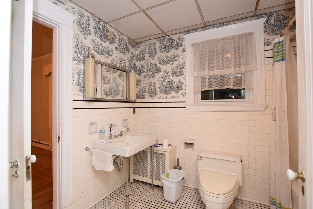 230 Oakley Road Woonsocket, RI 02895 - Photo 11 of 20 a bathroom with a sink toilet and shower