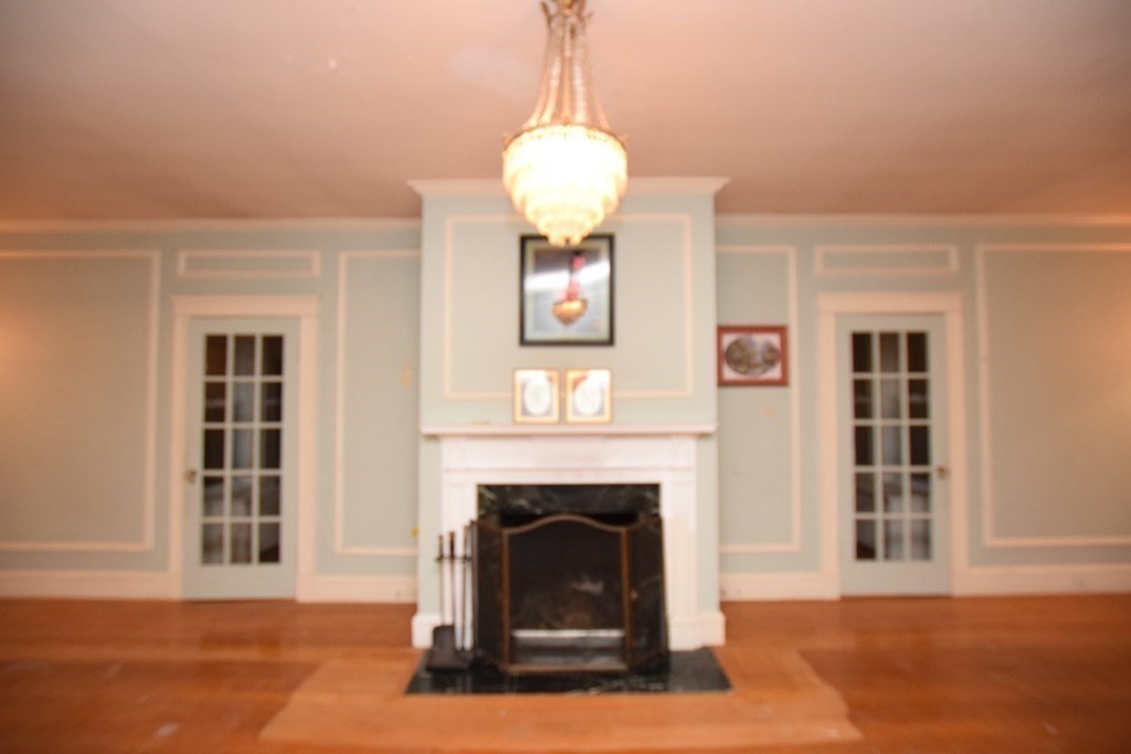 230 Oakley Road Woonsocket, RI 02895 - Photo 3 of 20 a living room with furniture and a fireplace