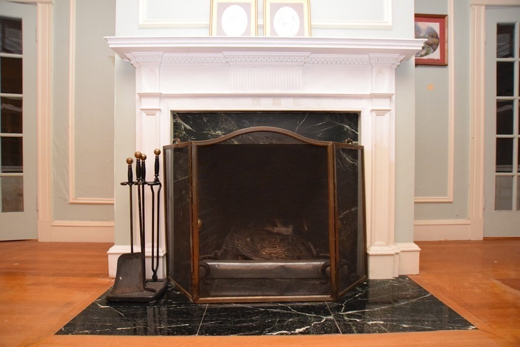 230 Oakley Road Woonsocket, RI 02895 - Photo 4 of 20 a closeup of a fireplace
