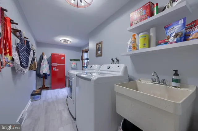 a utility room with dryer and washer