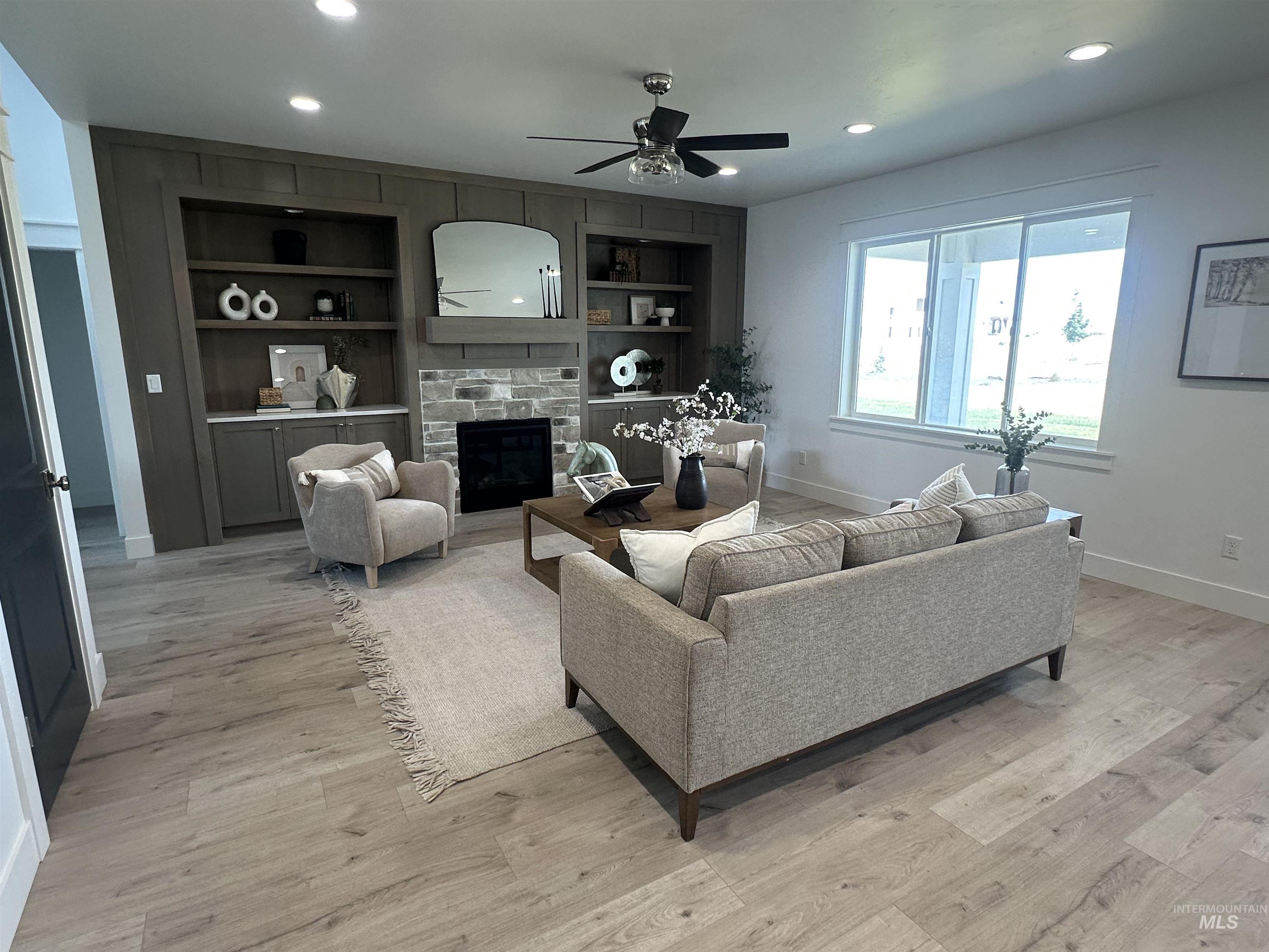 3035 Lake View Twin Falls, ID 83301 - Photo 6 of 41 Dining area featuring wood-finish flooring, a contemporary chandelier, and ample natural light through a large window
