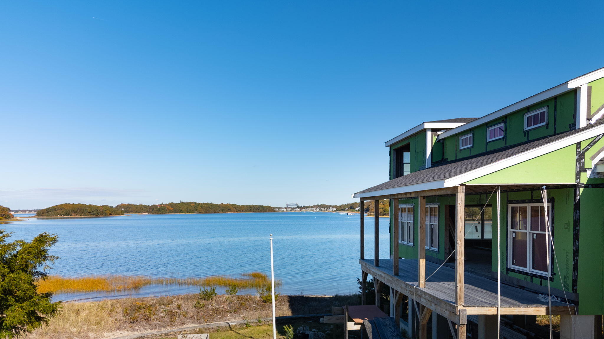 14 Navajo Road Pocasset, MA 02559 - Photo 3 of 19 a balcony with an ocean view