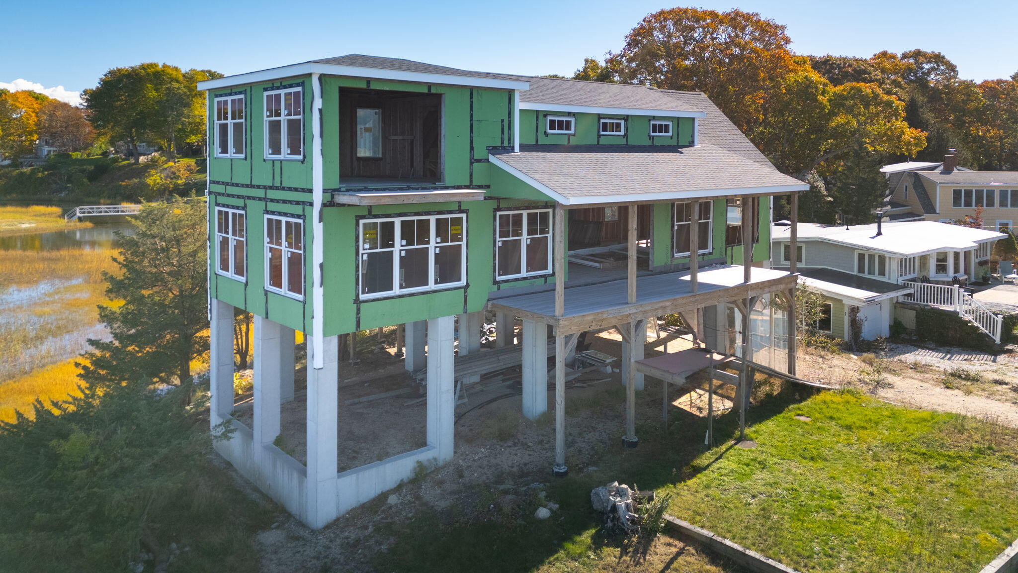 14 Navajo Road Pocasset, MA 02559 - Photo 5 of 19 an aerial view of a house with garden space and sitting area
