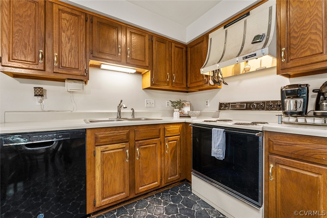 3601 Markey Road Midlothian, VA 23112 - Photo 15 of 33 a kitchen with stainless steel appliances granite countertop a sink stove and cabinets