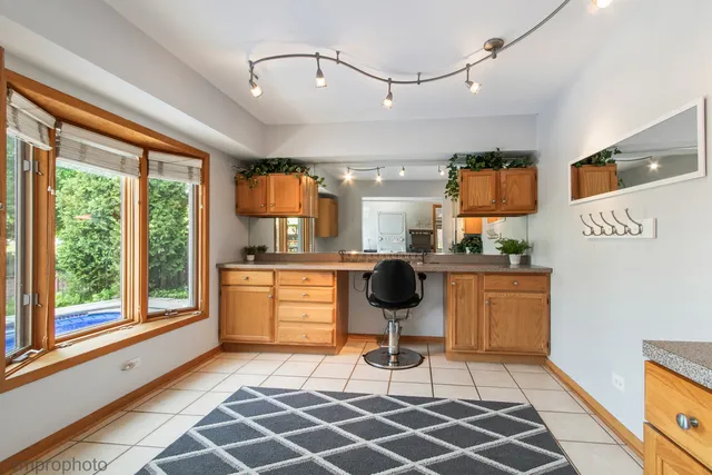 a bathroom with a sink toilet and mirror